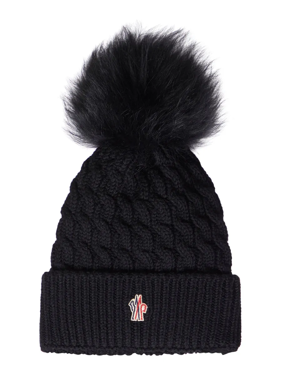Cappello in lana con pon pon