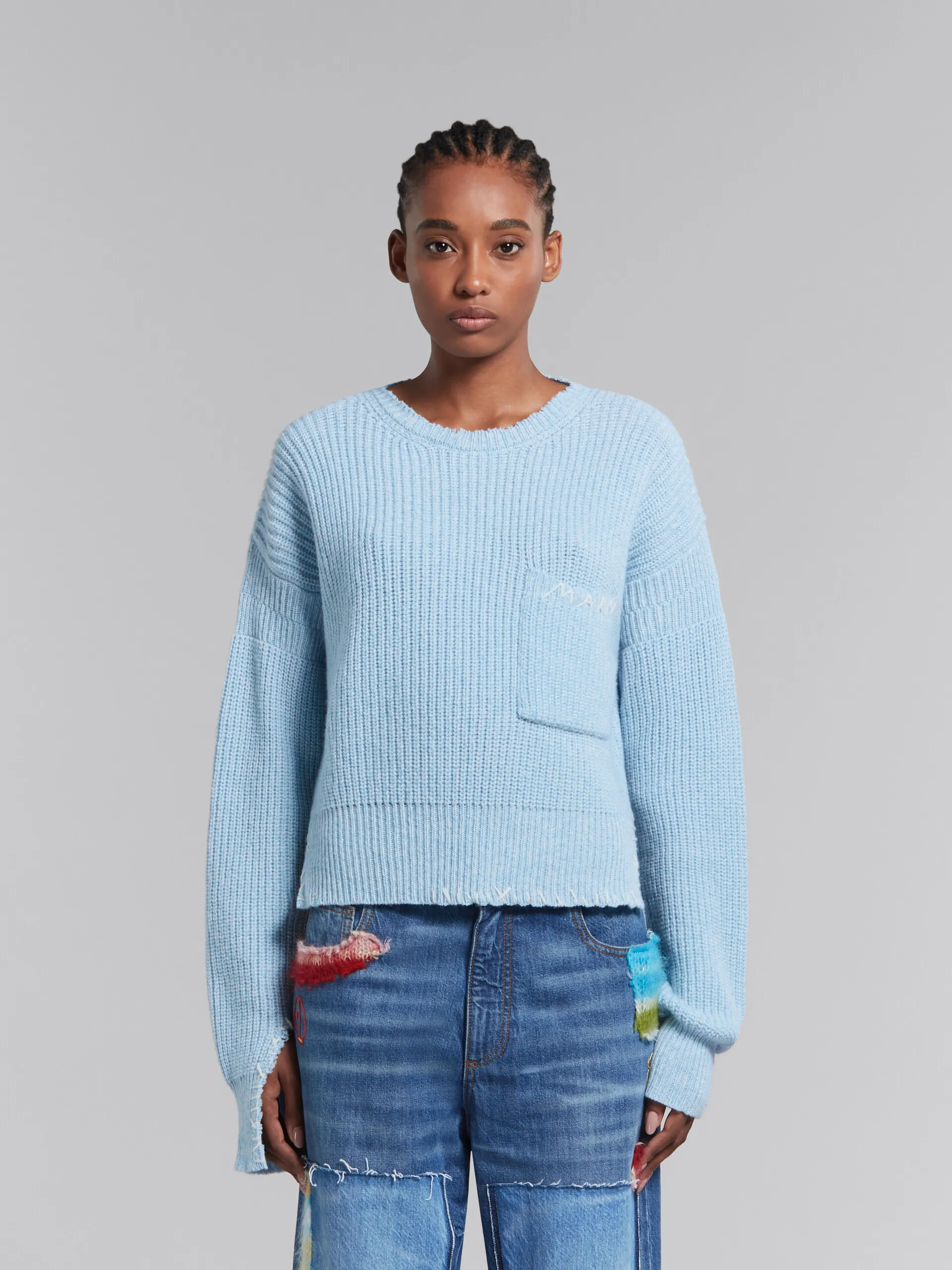 Maglione mouliné blu con impunture a contrasto