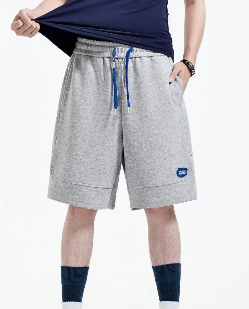 Pantaloncini sportivi da uomo larghi e comodi con coulisse