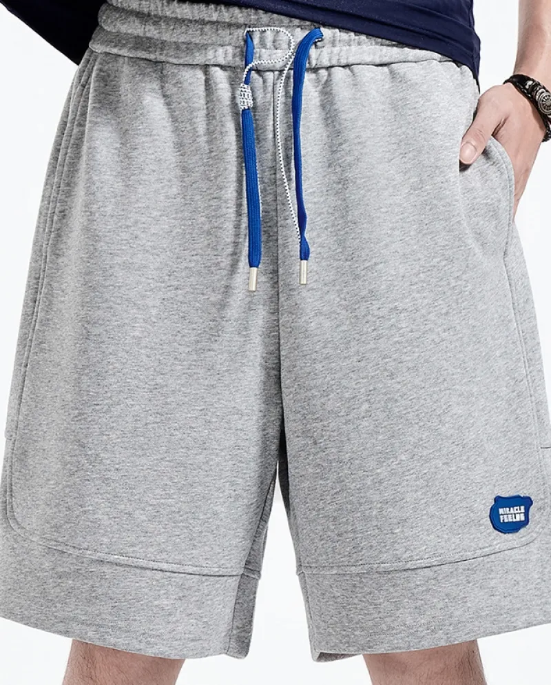 Pantaloncini sportivi da uomo larghi e comodi con coulisse