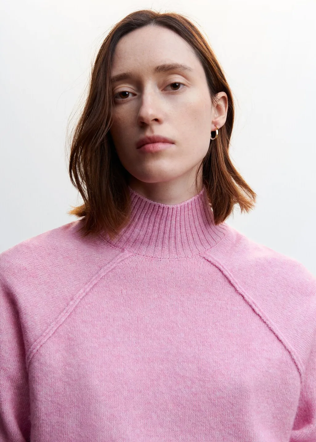 Pullover collo alto cuciture