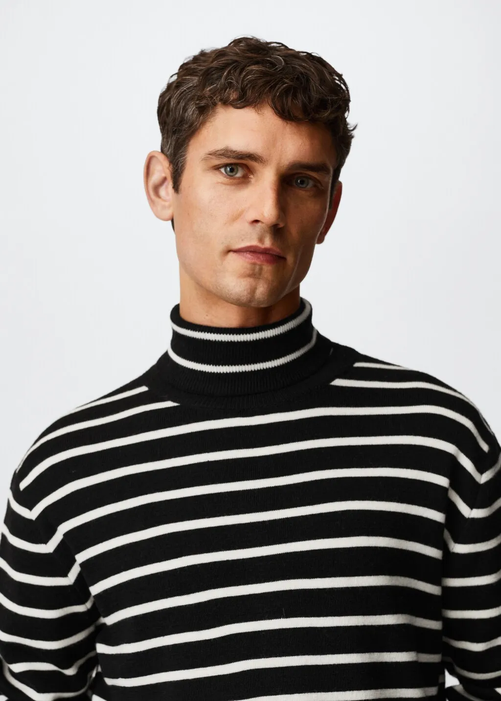 Pullover righe collo alto